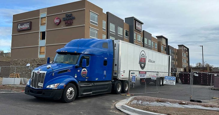 Dry-van-trailer-unloading-at-hotel