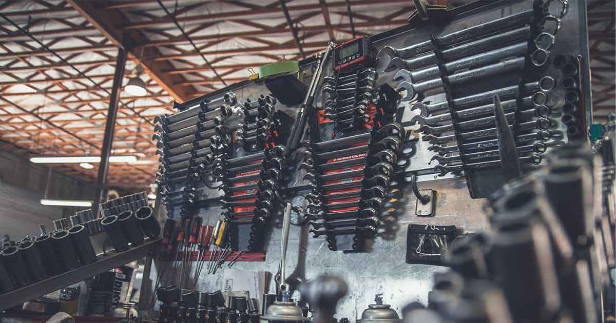 Mechanic workbench loaded with dirty tools