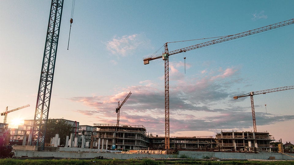Four-Cranes-on-Job-Sites