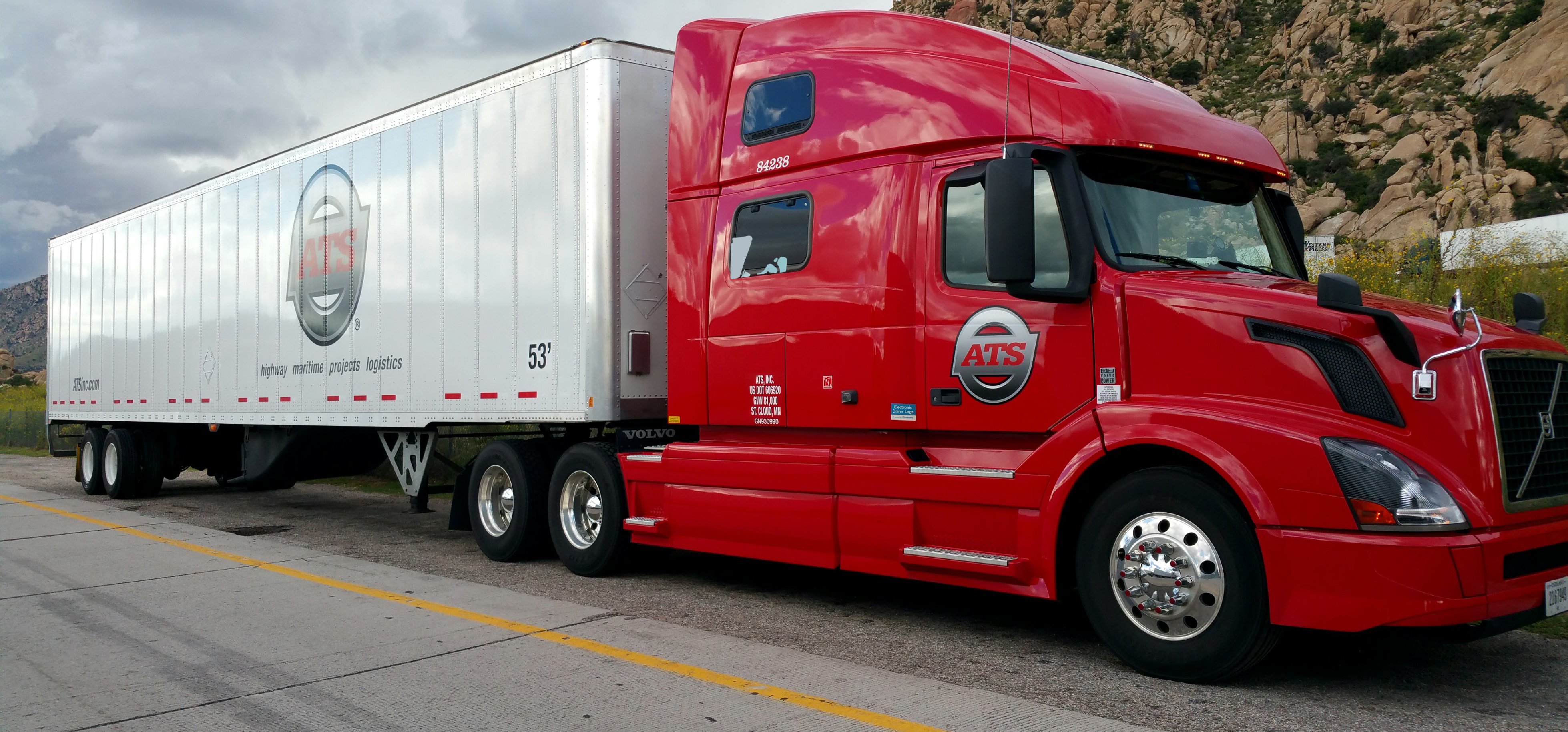 An ATS truck hauling a dry van 