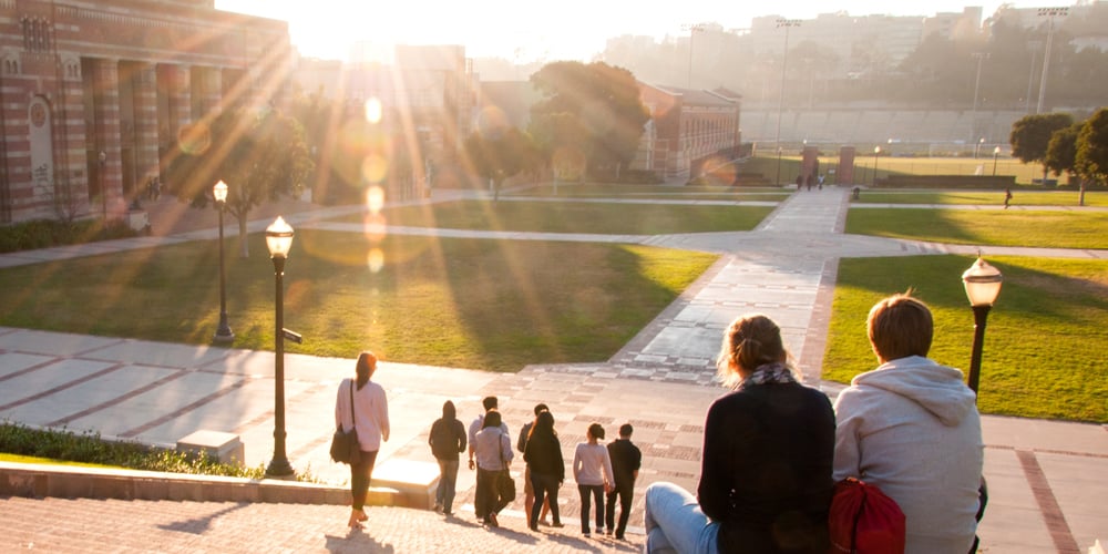 Students sitting on college campus
