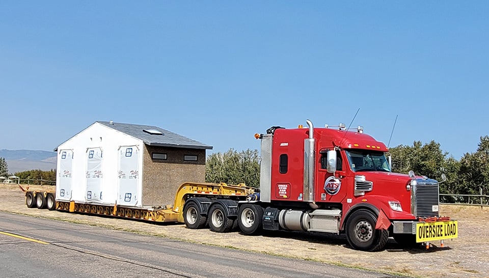 tiny house on a flatbed truck