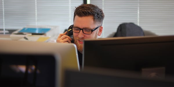 Man on the phone in office