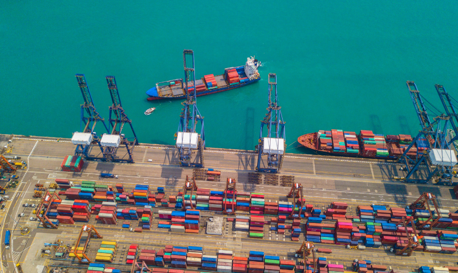 Container ships are unloaded at a port