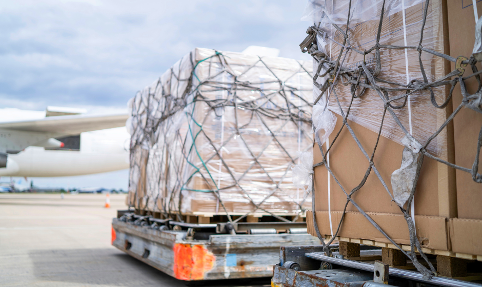 Boxed freight waiting to be loaded onto an aircraft