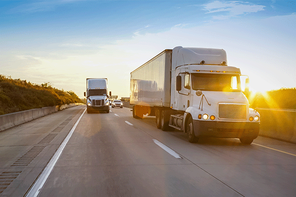 two-semis-on-highway