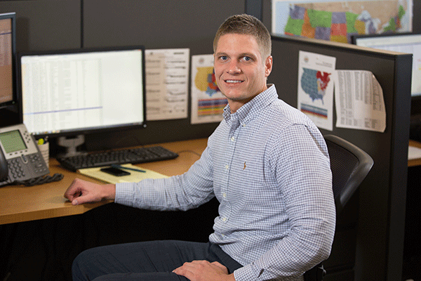 salesman-sitting-at-desk