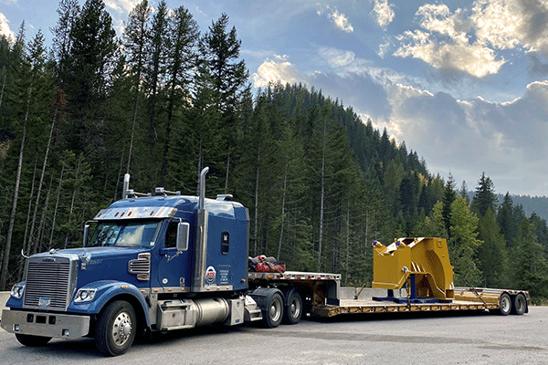 Double drop trailer loaded with freight