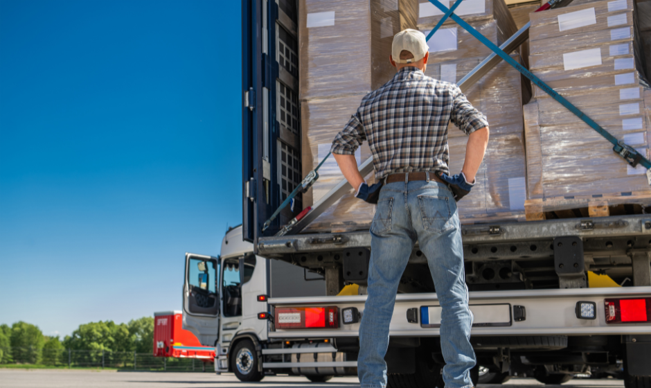truck driver finishes loading dry van