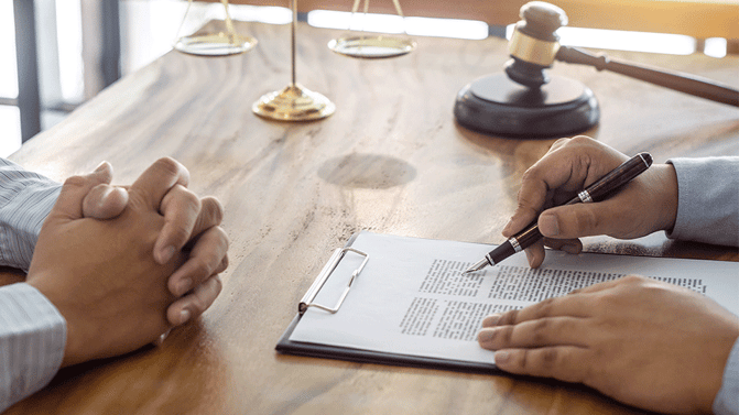 Manager-Going-Over-Contract-With-Employee