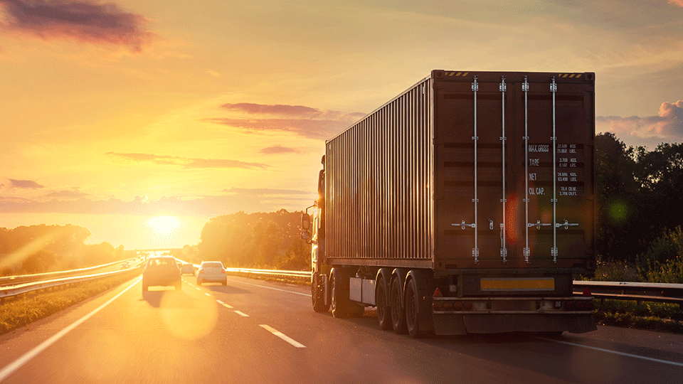 Semi-truck-with-chassis-hauling-container