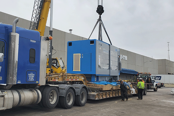 Heavy haul freight shipment getting loaded