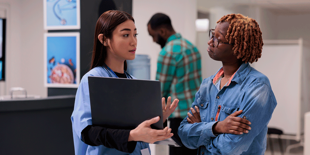 Nurse intern talking to her supervisor.