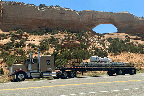 An example of power-only trucking featuring a flatbed trailer