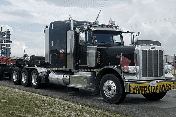 semi-tractor-hauling-machinery