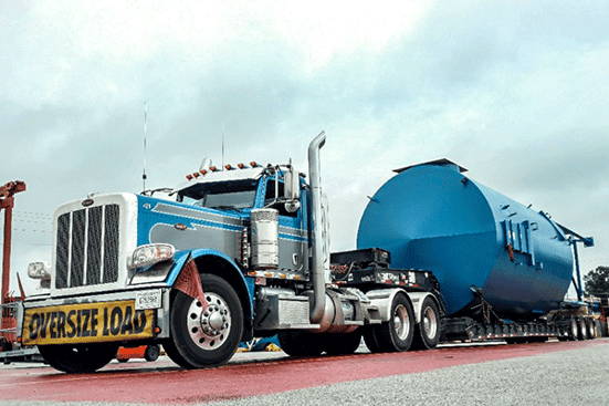 Oversized tank shipment on open deck trailer